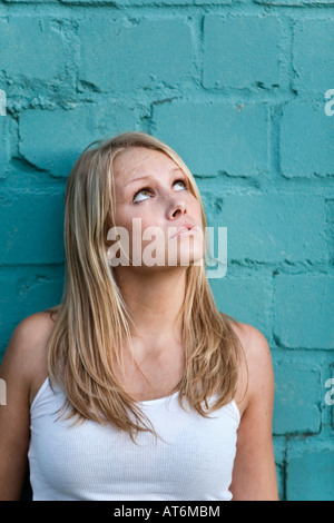 Young woman in white top, close-up, portrait Stock Photo