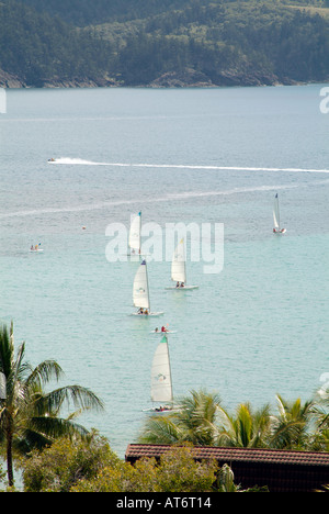 windsurfer wind surfer windsurfing surfing watersports beach airlee beach queensland Proserpine Airlee Beach boat ship marina ya Stock Photo