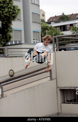 traceur practicing parkour in Germany Stock Photo