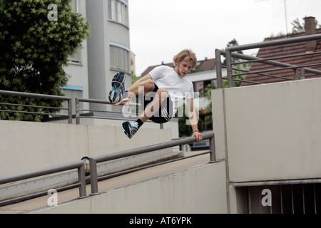 traceur practicing parkour in Germany Stock Photo