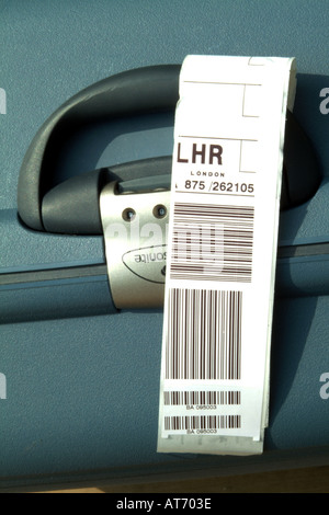 Airline baggage tag on a suitcase showing LGW (Gatwick Stock Photo - Alamy