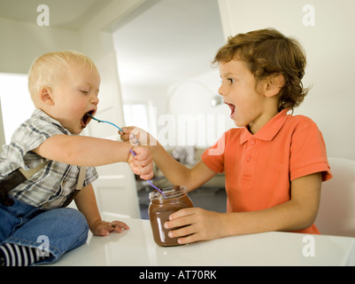 Two boys (4-5), (12-24 months), portrait Stock Photo