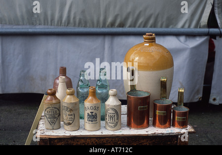 Old fashioned medical bottles for sale at the Saturday market Walcot Street Bath Spa, Somerset, UK Stock Photo