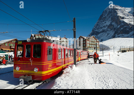 Jungfraujoch railway at Kleiner Scheidegg with the North Face of the Eiger behind Stock Photo