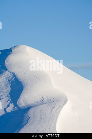 Snow covered mound at winter , Finland Stock Photo