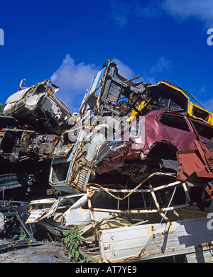 Wrecked cars piled up in scrapyard, Guadeloupe, French West Indies Stock Photo