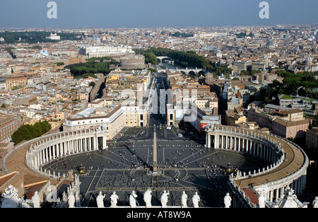View from the dome of St Peter's basilica down to the great piazza and on to the Tiber river and Rome's historical centre Stock Photo