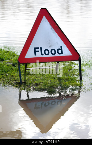 Flood warning road sign in a lane flooded by the River Severn at Chaceley, Gloucestershire Stock Photo