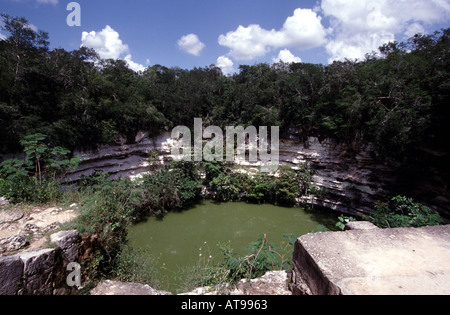 Chichen s sacred cenote well Chichen Itza Stock Photo