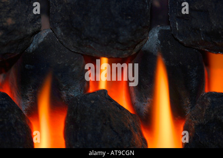 Closeup Of Gas Fire Flames & Artifical Coal. Stock Photo