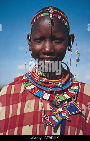 Portrait of Maasai young woman wearing ornaments and earrings Amboseli National Park Kenya East Africa Stock Photo