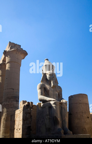 Statue of Ramses II in summer sun sunshine Karnak Temple UNESCO World Heritage Site Luxor Egypt Africa Stock Photo