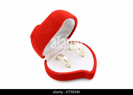 Wedding rings in a heart shaped box Stock Photo