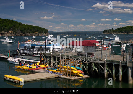 Piers boats kayaks and lobster trap buoys in Bar Harbor Maine Stock Photo