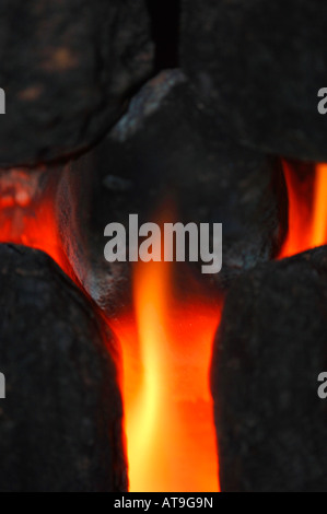 Closeup Of Gas Fire Flames & Artifical Coal. Stock Photo