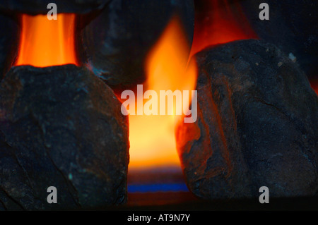 Closeup Of Gas Fire Flames & Artifical Coal. Stock Photo