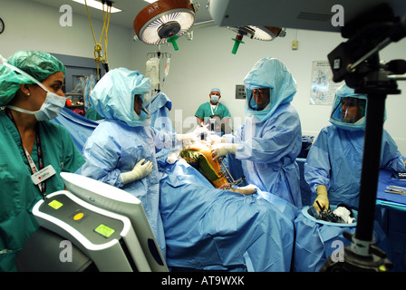 Surgeons perform a knee replacement surgery at a Connecticut Hospital in the USA. EDITORIAL USE ONLY Stock Photo