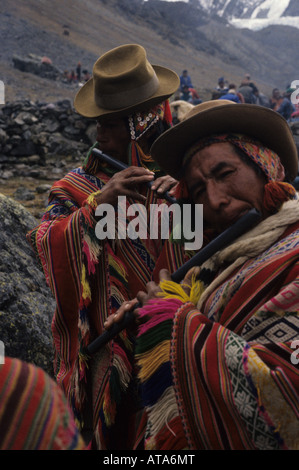 Native Quechua indian playing the quena traditional flute in Cuzco ...