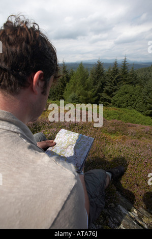 Man reading map on a walk in the Lake District (South of Coniston) Stock Photo