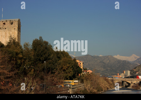 Snow covered mountains and River Roya at Ventimiglia Stock Photo