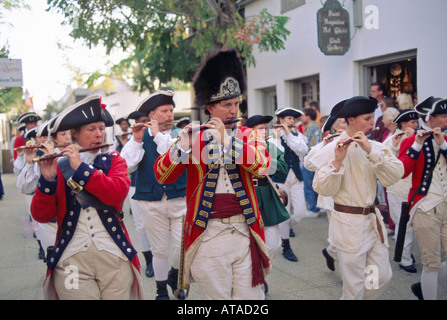 Reenactors playing flutes in a parade on a street in St Augustine Florida USA Stock Photo