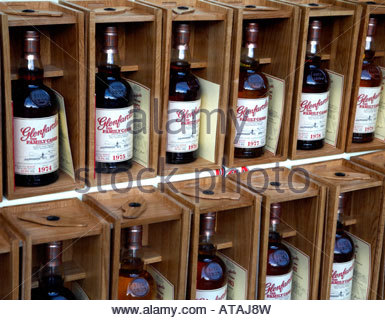 Glenfarclas whisky bottles in window display Stock Photo
