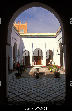tourists, courtyard, patio, water fountain, fountain, Bahia Palace, Palais de la Bahia, Marrakech, Marrakech Province, Morocco, North Africa, Africa Stock Photo
