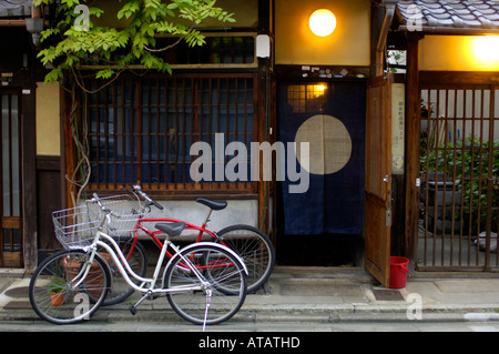 Bicycles outside a small Ryokan in a quiet Kyoto neighbourhood, Japan Stock Photo