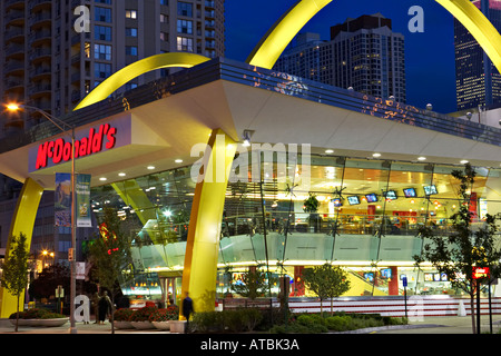 STREET SCENE Chicago Illinois McDonald s restaurant on Ontario Street at night Golden Arches in River North Stock Photo