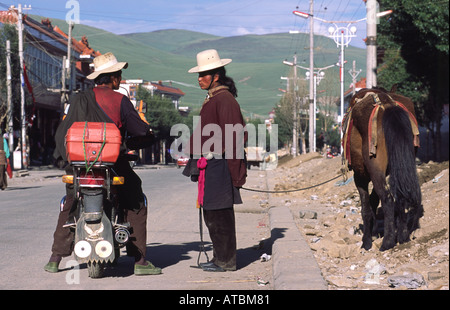 New and old ways of transport in Litang. Sichuan, China Stock Photo