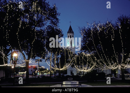 Trees in the main plaza decorated with lights for the Christmas season in St Augustine Florida USA Stock Photo