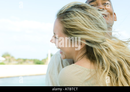 Couple laughing together, cropped view Stock Photo