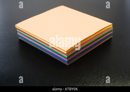 Stack of multicolored paper, close-up Stock Photo
