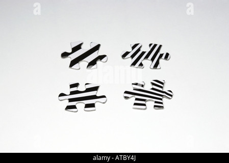 Striped puzzle pieces, close-up Stock Photo