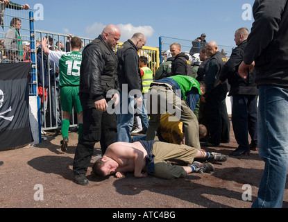 Fights during a local derby between FC Magdeburg and FC Saxony Leipzig, Germany Stock Photo