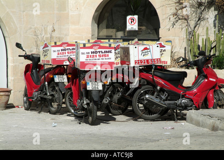 pizza, hut, delivery, mopeds, scooter, man, boy, junk, food, honda 50, fifty, food, fast, takewawy, take, away, Stock Photo