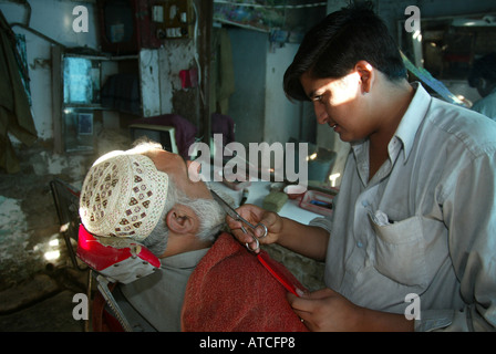 afghan refugees who found daily labour in Peshawar Stock Photo