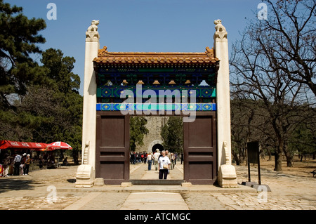 Tourist looking back through the Inner Red Gate to the Sacred Way, Ming Tombs, Beijing Stock Photo