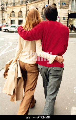rear view of a elegant couple walking on white background Stock Photo ...