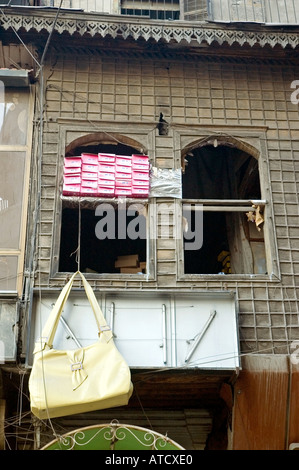 Quirky handbag advertisement on Building facade in Jedeideh Quarter old city of Halab, Aleppo, Syria, Middle East. DSC 6262 Stock Photo