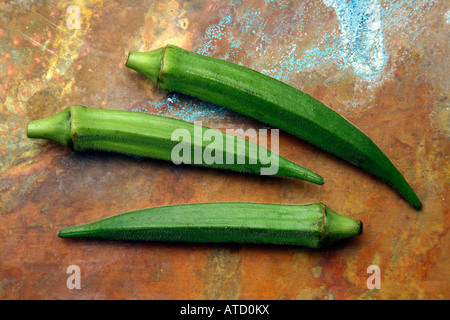 Okra on an rustic copper background. Stock Photo