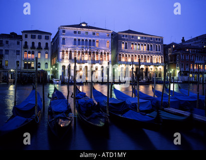 Gondolas and Grand Canal at twilight night San Polo Venice Veneto Italy Stock Photo