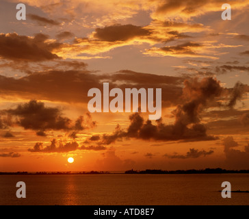 Evening sky with dramatic clouds over the river. Dramatic sunset in ...