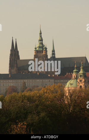 St Vitus towers over Prague Castle ion the golden October evening Stock Photo