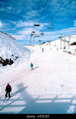 Avoriaz FRANCE, Adult Skiers Skiing on Ski Slope in French Alps Travel winter scenes'Vacation Sports Snow Scene Mountains Stock Photo