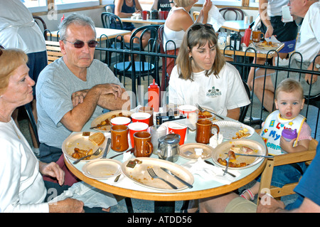 Ocean City, NJ, USA, American Family in Restaurant on 'Jersey Shore'   Sharing Meals Table, middle class family at the restaurant Stock Photo