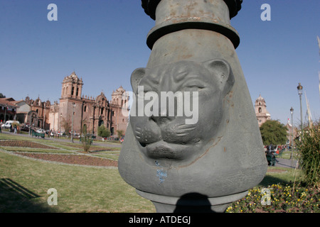 The face of a Puma sits on a utility pole in the Plaza De Armas, Cusco Peru Stock Photo