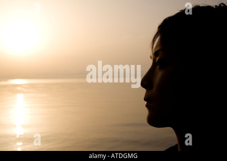 Silhouette of young woman Stock Photo