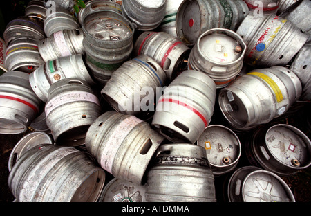 Empty aluminium beer barrels await collection and refilling from a pub in Shoreham on Sea in West Sussex Stock Photo