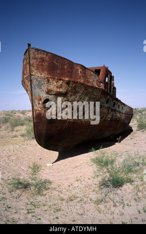 Ship cemetery at what used to be the Aral Sea in the former Uzbek fishing village of Moynaq. Stock Photo